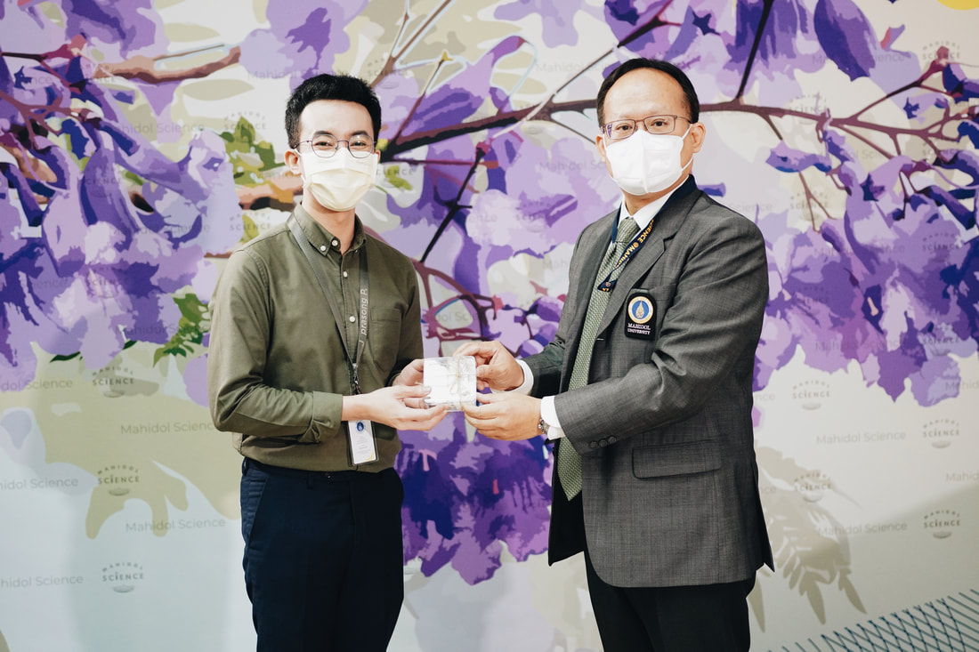 Received a token of appreciation from the Dean of Faculty of Science, Mahidol University at the Faculty of Science Graduate Student Orientation (August 2022)